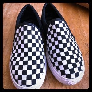 Black and white slip on’s